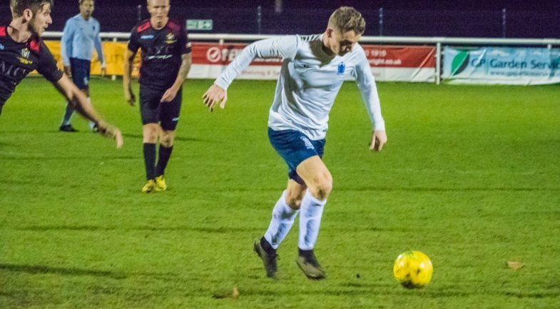 James Breeden drives forwards for the Rep Team v Lloyds